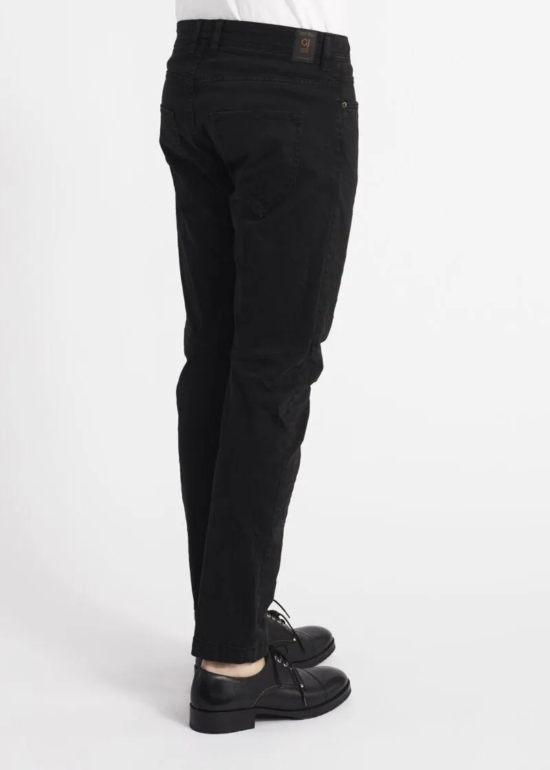 Jeans con bottoni a vista
