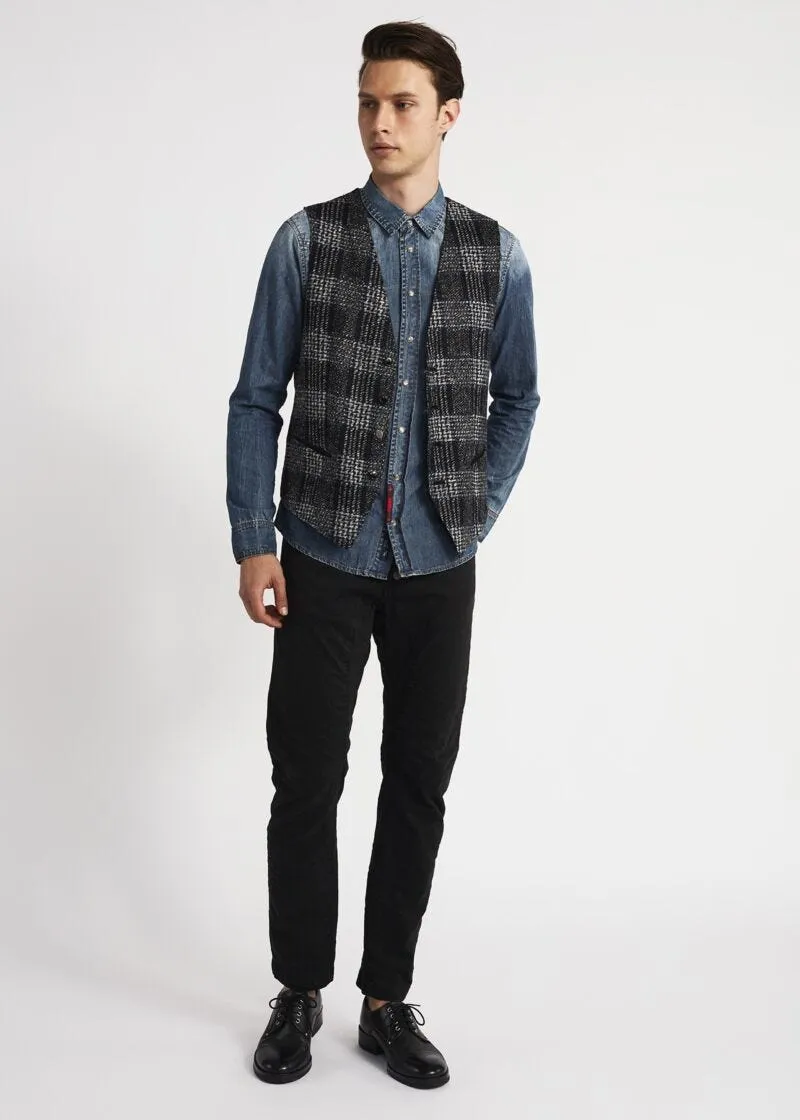 Jeans con bottoni a vista