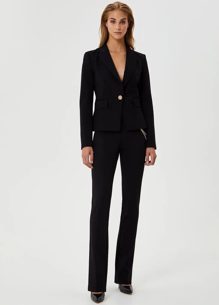 Pantalone bootcut con catena
