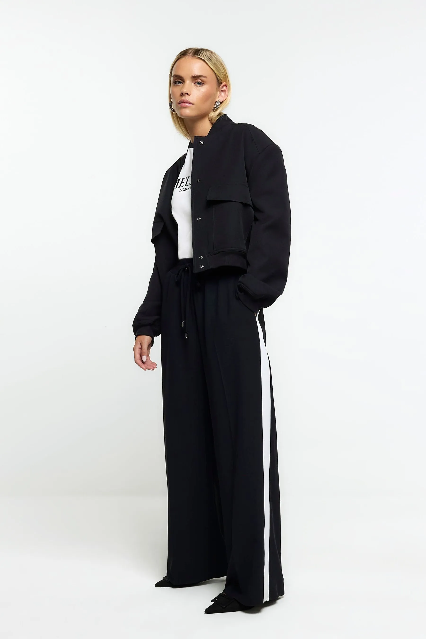 River Island Petite - A righe a fondo Pantaloni da jogging ampio