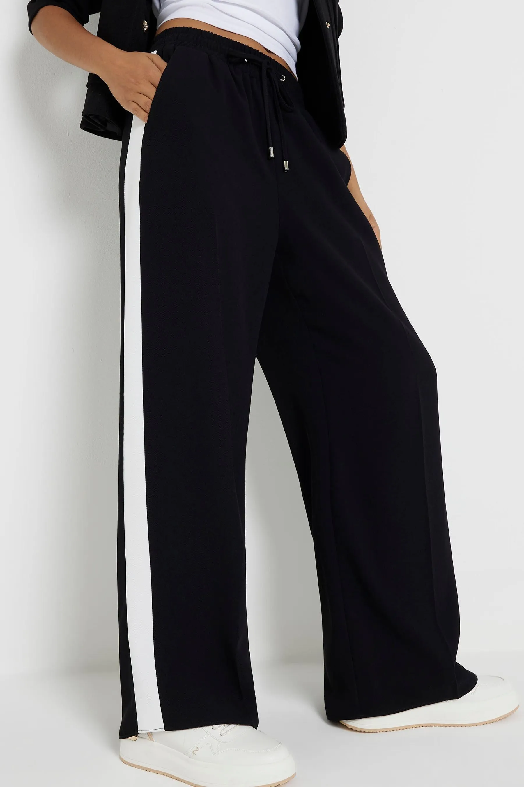 River Island Petite - A righe a fondo Pantaloni da jogging ampio