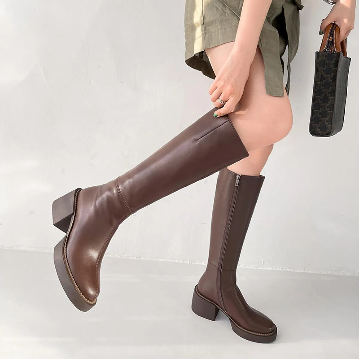 Stivali con plateau da donna in vera pelle Stivali con plateau invernali in vera pelle Stivali da donna